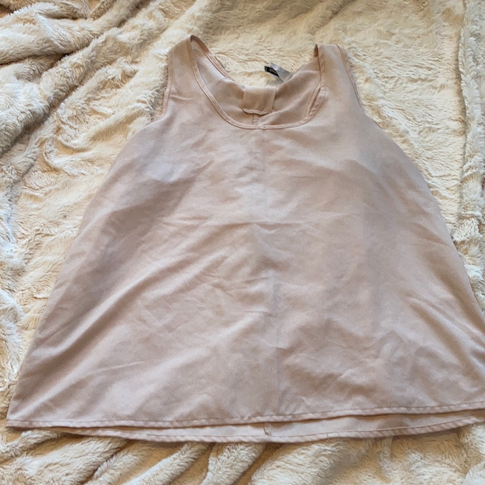 Beige blouse with adorable bow detail on back